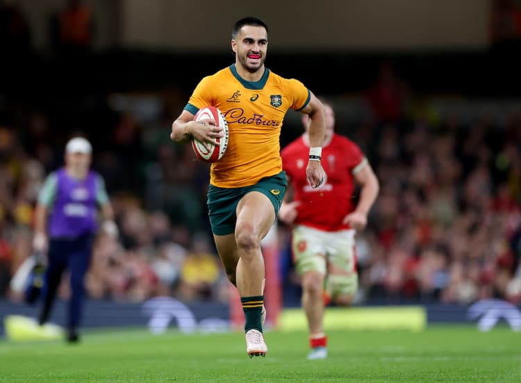 Tom Wright on his way to scoring against Wales in Sydney in 2024. Photo: Getty Images