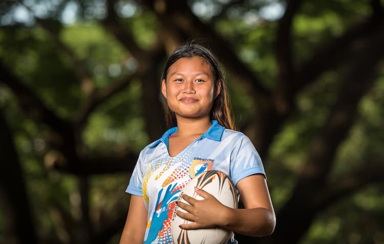 RA Tour applications young girl holding rugby ball