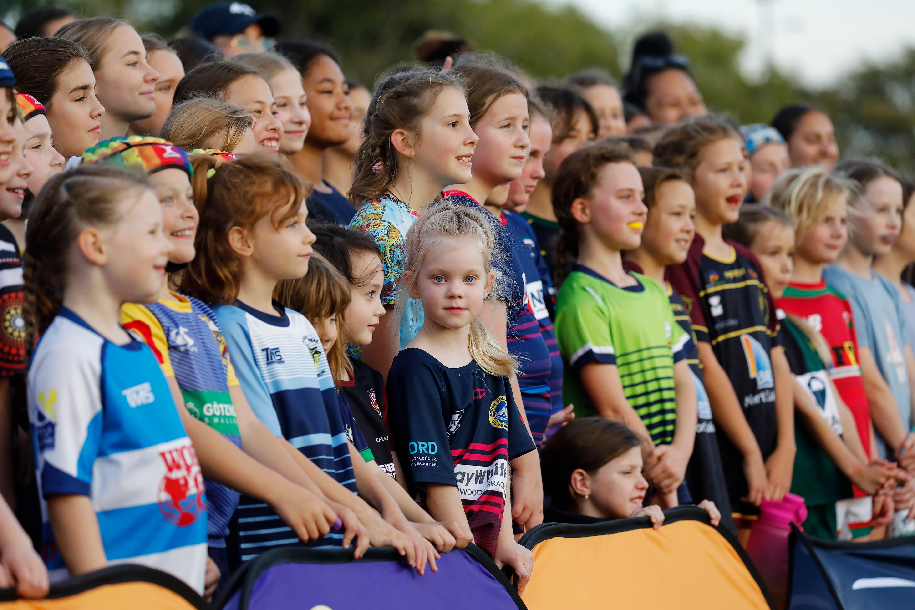 A girls rugby clinic ahead of the Wallaroos v Black Ferns Test match at Kayo Stadium, Brisbane. June 2023