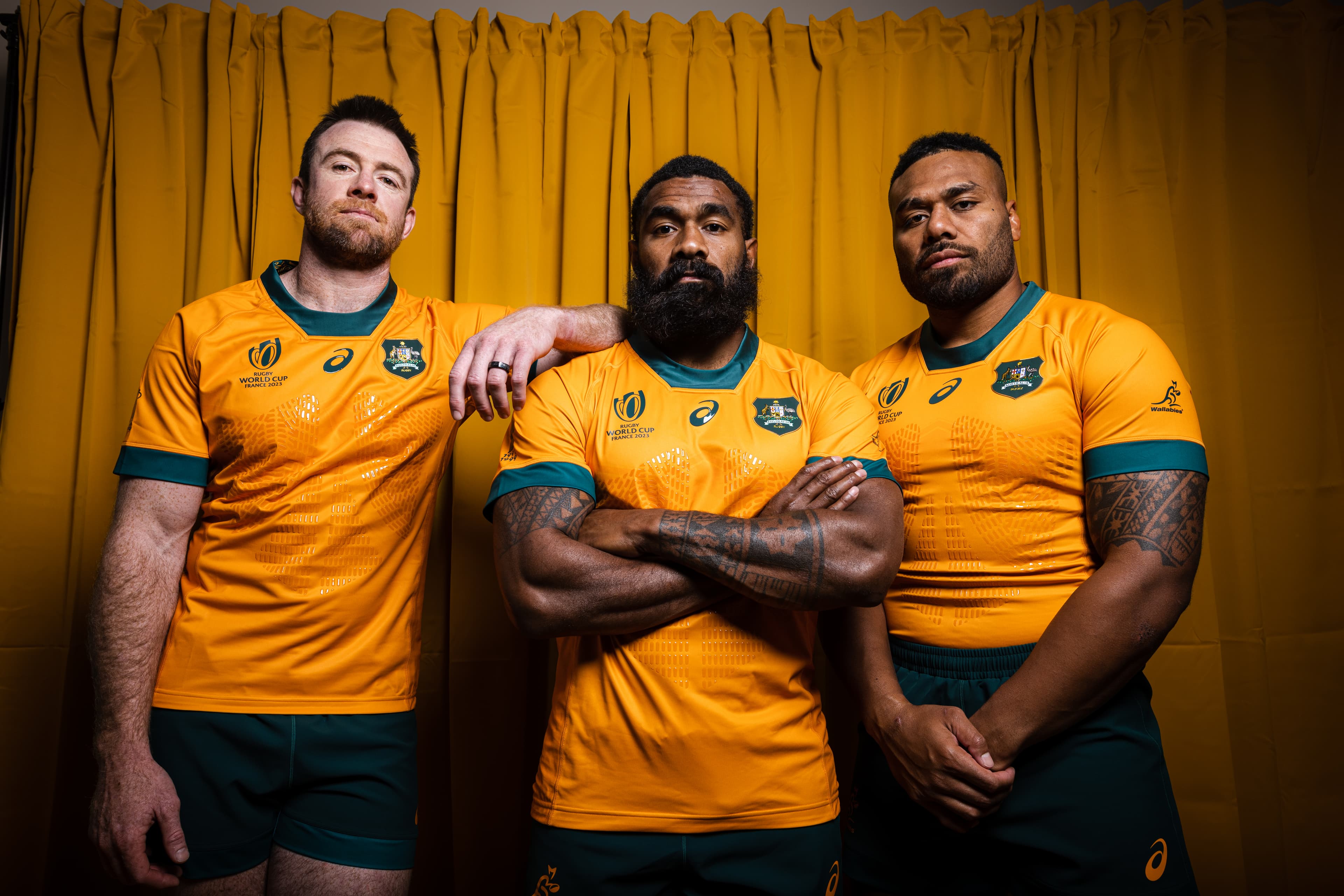 Jed Holloway, Marika Koroibete and Samu Kerevi model the 2023 Wallabies jersey by ASICS. Photo: Brendan Hertel/RugbyAU Media