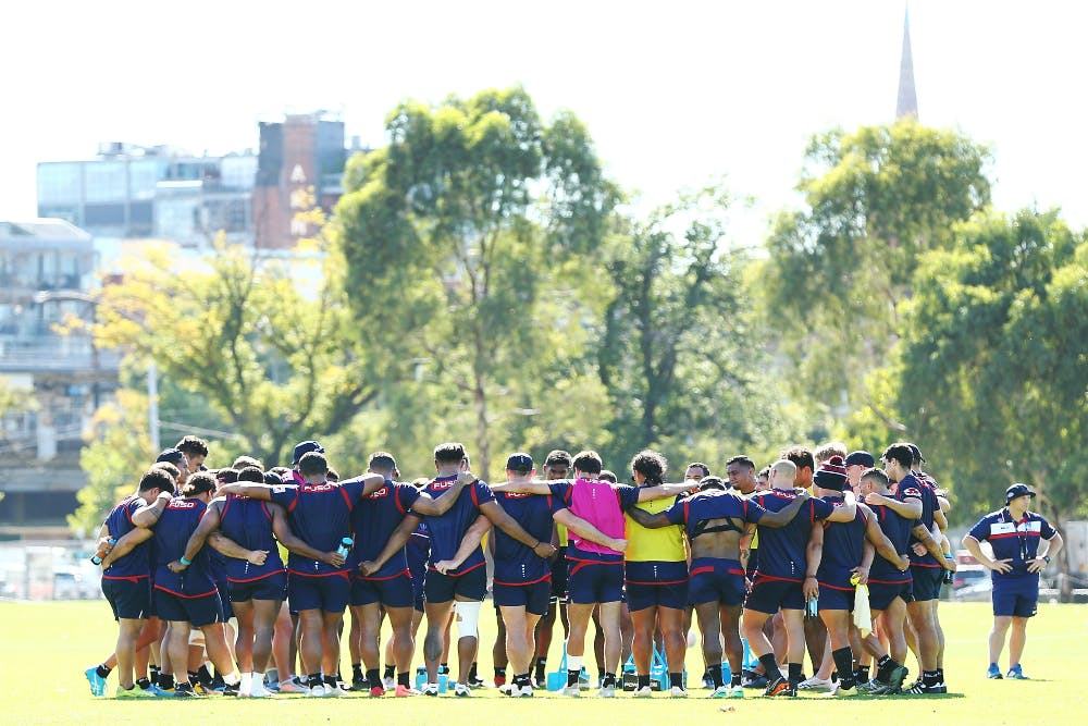 Players huddle ahead of training. Photo: Getty Images