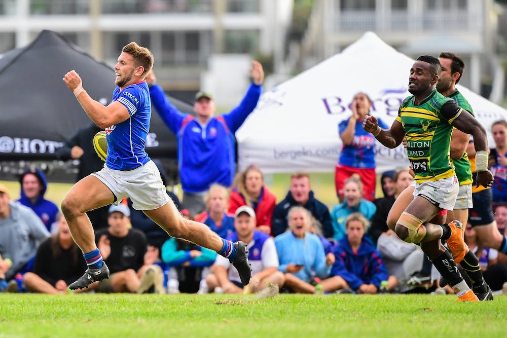 Manly's Josh Turner races away to score in the final and win the Kiama Sevens. Photo: Stu Walmsley/RUGBY.com.au